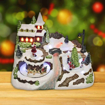 Világító karácsonyi falu, mozgó szánnal, mikulással gyermekekkel Világító karácsonyi falu, mozgó szánnal, mikulással gyermekekkel